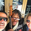 Dee Bryson, right, St. Louis street music artist, center, and Jorge Maldanado.