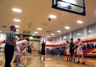 Austin Jones, in his last game as a Garfield-Palouse four-year starter, shoots the first of two free throws.